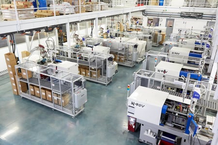 Injection molding presses at PCI's Bunsen lights out manufacturing facility