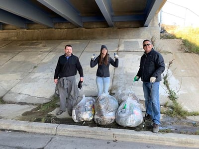 PCI river cleanup under a bridge