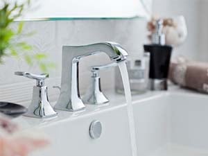 Plastic components for plumbing of a faucet