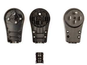Close up of various parts manufactured with plastic injection molding.